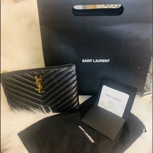 Saint Laurent Medium Matelasse  Leather wristlet..